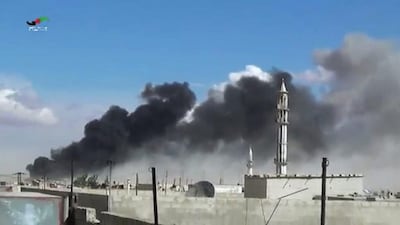 Smoke rises after air strikes by military jets in Talbiseh of the Homs province, western Syria, on September 30, 2015. Russian military jets carried out air strikes in Syria for the first time on Wednesday. Homs Media Centre via AP