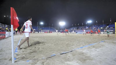 A corner is taken during the game between the UAE and Spain.