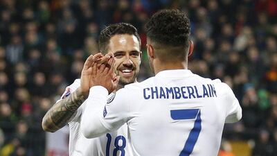 Alex Oxlade-Chamberlain celebrates after scoring on Monday night with Danny Ings in their Euro 2016 qualifier against Lithuania. Carl Recine / Action Images / Reuters