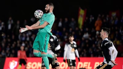 Real Madrid's French forward Karim Benzema (L) controls the ball during the Copa del Rey (King's Cup) football match between Unionistas de Salamanca CF and Real Madrid CF at Las Pistas del Helmantico stadium in Salamanca, on January 22, 2020. / AFP / JAVIER SORIANO