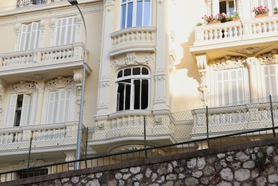 The damaged window of a residential building following an explosion in Monaco. Reuters