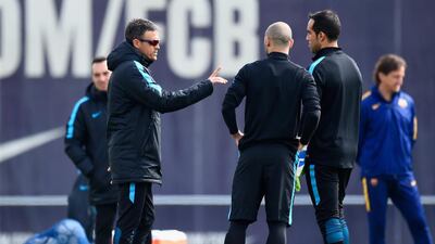 Luis Enrique manager in discussion with Javier Mascherano and Claudio Bravo. David Ramos / Getty Images