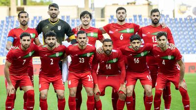 Iran's number 14 Saman Ghoddos, front row third from right, with his Iranian teammates before a World Cup warm-up game against Austria. EPA
