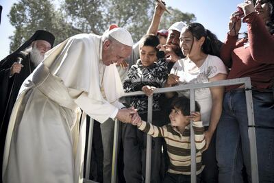 Pope Francis meets migrants at Moria detention centre on Lesbos, Greece. Andrea Bonetti / Greek prime minister's office via Getty