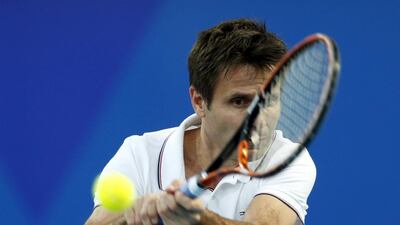 Indian Aces’ Fabrice Santoro of France hits a return to Legendari Japan Warriors’ Thomas Enqvist of Sweden during their match at the International Premier Tennis League (IPTL) in Dubai, December 14, 2015. REUTERS/Ahmed Jadallah