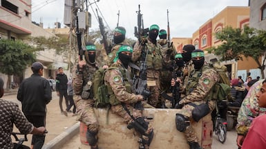 Hamas fighters patrol a street in Gaza. AFP