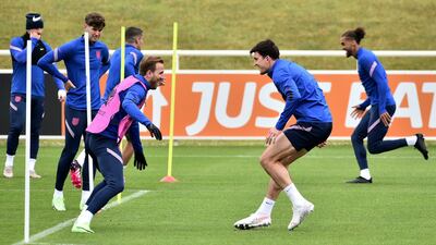 England's Harry Kane, left, and Harry Maguire. PA