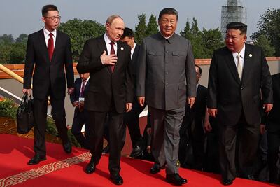 Russian President Vladimir Putin, second left, with China's President Xi Jinping, second right, and North Korean leader Kim Jong-un before a military parade marking the 80th anniversary of victory over Japan and the end of Second World War in Beijing. AFP
