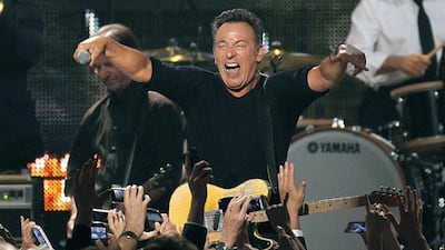 Bruce Springsteen performs "Born To Run" during the 2013 MusiCares Person of the Year tribute honoring Bruce Springsteen in Los Angeles, California in this February 9, 2013 file photo. Springsteen's hand-written "born to Run" draft fetched $197,000 at Sotheby's Auction December 5, 2013. REUTERS/Mario Anzuoni/Files (UNITED STATES - Tags: ENTERTAINMENT)