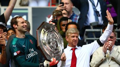 Arsenal's Petr Cech and Arsene Wenger celebrate with The Community Shield. Dan Istitene / Getty Images