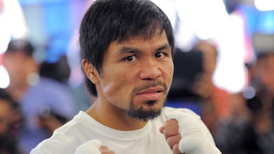 Manny Pacquiao will fight Timothy Bradley at the MGM Grand in Las Vegas on April 12. Joe Klamar / AFP