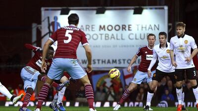 West Ham United’s Cheikhou Kouyate, left, scores the opener to give West Ham United a 1-0 lead over Manchester United during their Premier League match on Sunday. Eddie Keogh / Reuters
