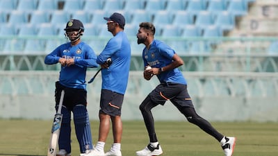 India's Mohammed Siraj, right, bowls during a training session ahead of the first T20 against Sri Lanka in Lucknow on Tuesday, February 22, 2022. AP