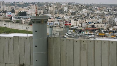 A tower on the West Bank separation wall, near the Qalandia checkpoint between Ramallah and Jerusalem. Atef Safadi / EPA