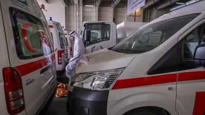 A UAE aid ship is loaded with supplies at Khalifa Port in Abu Dhabi, before sailing to Gaza via Al Arish, Egypt. Victor Besa / The National
