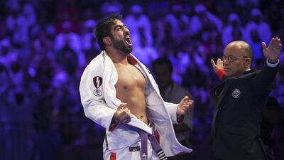 Yahia Mansour of the UAE picked up a second gold medal, this time in men's open division purple belt, with a victory over Sebastian Szyszka of Poland. Mona Al Marzooqi / The National