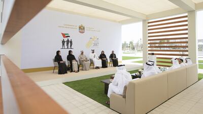 Mohammed Abdulla Al Gergawi, Minister of Cabinet Affairs and the Future, fourth left, at the Cabinet meeting. With him are Shamma Suhail Al Mazrouei, Minister of State for Youth Affairs, left, Reem Ibrahim Al Hashimi, Minister of State for International Cooperation, second left, Sultan bin Saeed Al Mansouri, Minister of Economy, third left, Najla Al Awar, Minister of Community Development, fifth left, and Ohood Al Roumi UAE Minister of State for Happiness, right. Ryan Carter / Crown Prince Court - Abu Dhabi