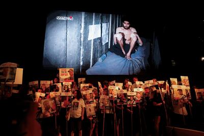 Demonstrators in Tel Aviv demand the release of hostages held in Gaza since the October 7, 2023, attack on Israel by Hamas and to end the war, as a video released by Hamas of hostage Evyatar David is displayed. Reuters