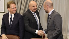 Lebanese President Joseph Aoun, centre, greets French Foreign Minister Jean-Noel Barrot, right, as Patrick Durel, France's ambassador to Lebanon, looks on during a meeting in Beirut. AFP