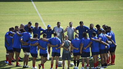 Samoa's players huddle during training. AFP