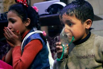 A child receives oxygen through a respirator following an alleged poison gas attack in the rebel-held town of Douma, near Damascus, in April 2018. AP