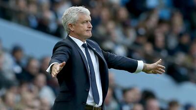Mark Hughes saw his Southampton lose 6-1 to reigning Premier League champions Manchester City on Sunday. EPA