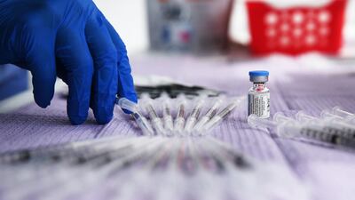 Doses of the single-shot Johnson & Johnson coronavirus vaccine are prepared for members of the immigrant community at a clinic in Los Angeles, California. Getty