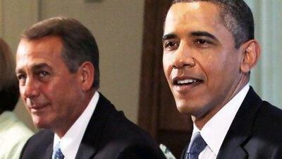 Barack Obama and congressman John Boehner. EPA