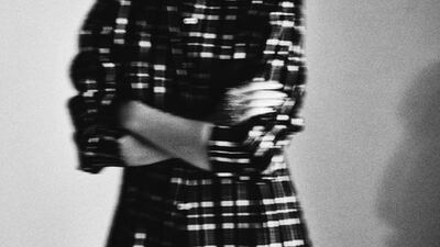 IN THE SHADOWS: Shirt dress, Dh910, Maje; shorts, Dh1,100, Vince; necklace, Dh1,100, Stella McCartney, all at Bloomingdale’s.