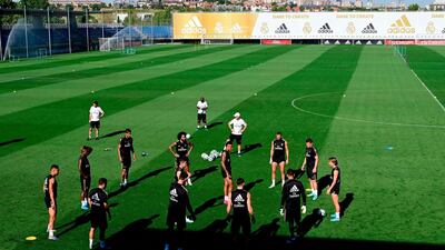 Real Madrid players take part in a training session. AFP