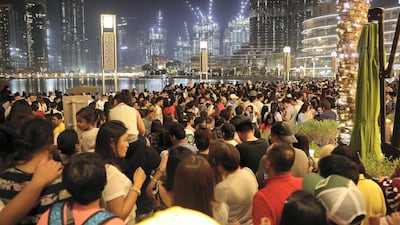 People gathered to see Burj Khalifa projecting the Philippine flag.