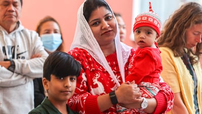 Families came together to offer Christmas Day morning prayers in Abu Dhabi. Victor Besa / The National