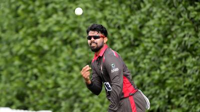 UAE's Basil Hameed took five wickets in the World Cup League 2. Pawan Singh / The National