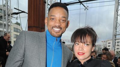 Will Smith, in Louis Vuitton, and Lily Allen attend the Louis Vuitton show during Paris Fashion Week on January 16, 2014 in Paris, France. Getty Images