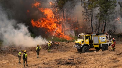 Wildfires have also broken out in Spain, with firefighters from the Castilla-y-Leon Military Emergencies unit battling blazes in a forest next to La Atalaya residential area, 80km west of Madrid. AFP
