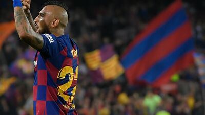 Barcelona's Chilean midfielder Arturo Vidal celebrates his goal against Real Valladolid at the Camp Nou stadium in Barcelona on October 29, 2019. / AFP / LLUIS GENE