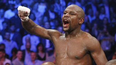 Floyd Mayweather will complete his six-fight Showtime contract against Andre Berto in September. John Locher / AP Photo