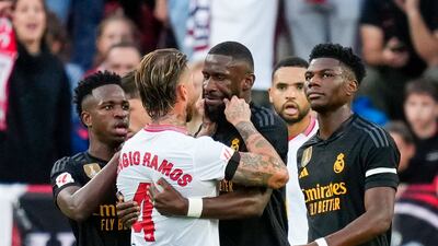 Sevilla's Sergio Ramos pulls the cheeks of Real Madrid defender Antonio Rudiger during their La Liga clash at the Ramon Sanchez Pizjuan stadium on October 21, 2023. AP