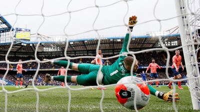 Everton goalkeeper Jordan Pickford is beaten by Mason Mount's shot that put Chelsea 1-0 up. Reuters