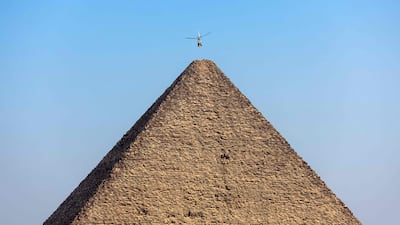 A helicopter from the Egyptian Air Force's Horus aerobatic team.