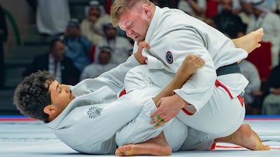Alexander Sak (right) against Dennis Souza. Photo: UAEJJF