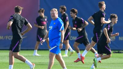 Barcelona manager Ronald Koeman oversees training. AFP