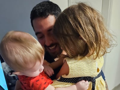 Faisal, Katy's husband, with both their children. Katy Gillett for The National