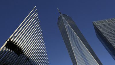 One World Trade Center, centre, stands between the transportation hub, left, still under construction, and 7 World Trade Center, second from right. Mark Lennihan / AP Photo