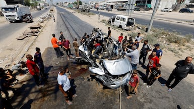 A vehicle hit by an Israeli strike in Deir Al Balah, central Gaza. Reuters