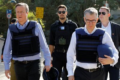 British Foreign Secretary David Cameron visits the site of a October 7 Hamas attack