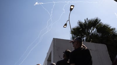 Contrails from interceptions of Iranian missiles in the sky above Israel. Reuters