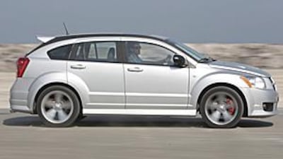 The Caliber varies significantly from the standard hatchback featuring a more muscular stance and a functional air intake on the bonnet.