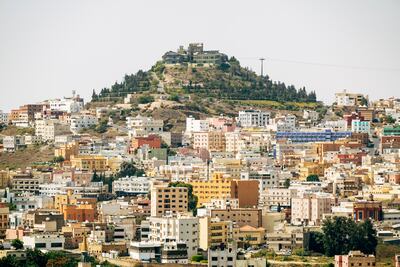 Green Mountain illuminates Abha's skyline in Asir Province, Saudi Arabia. Getty Images
