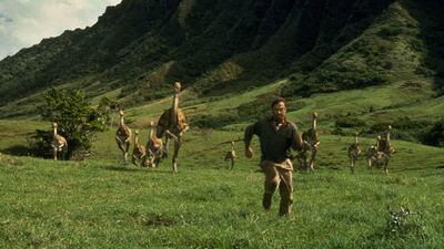 Sam Neill, portraying Dr Alan Grant, runs from dinosaurs in a scene from Jurassic Park. There are rumors of the sequel being shot in Abu Dhabi. Universal Pictures, File / AP photos